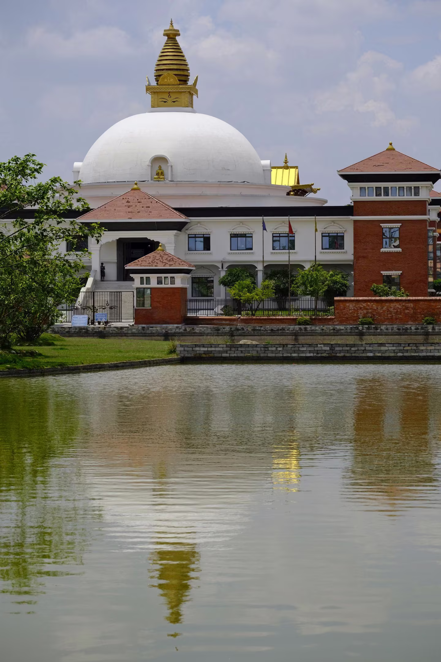 A Buddhist temple beside still water