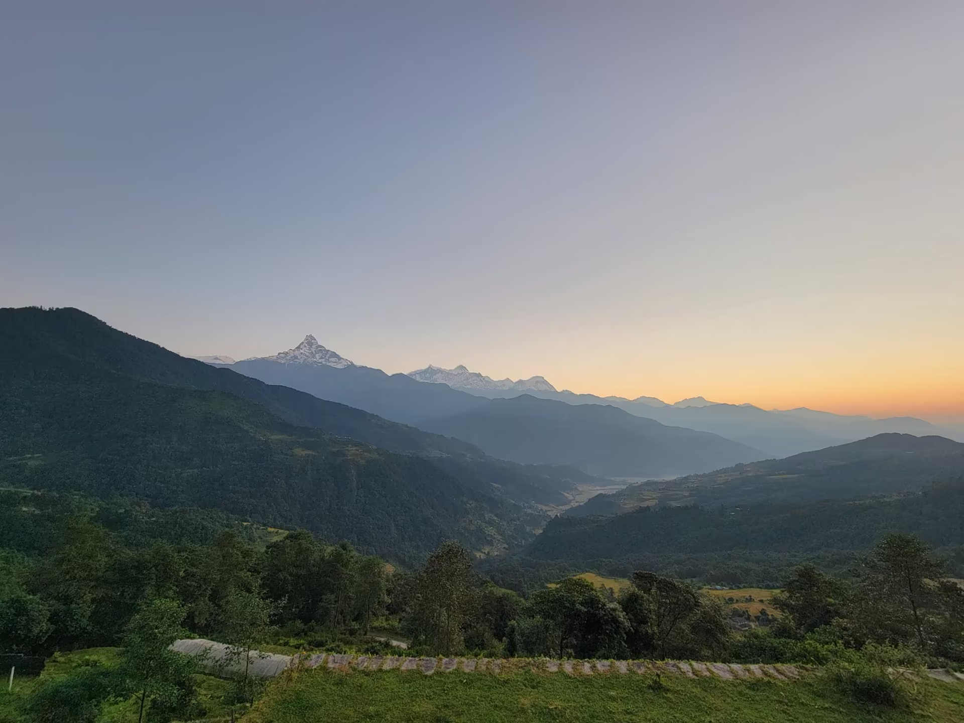 A river winding through a green Nepali valley