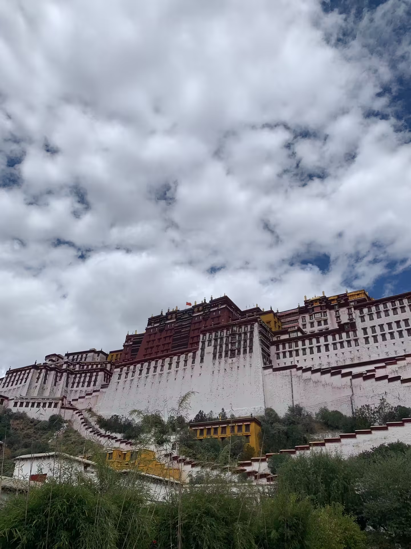 Aerial view of the Potala Palace in Lhasa, Tibet — a landmark that draws the comparison with Nepal's own Buddhist heritage